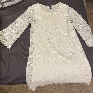 White lace dress with long sleeves above the knee dress